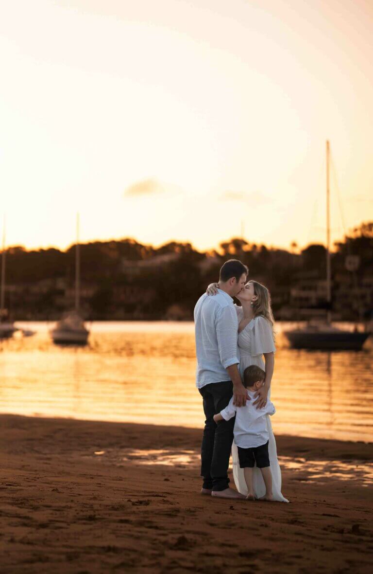 Family photo couple with toddler boy on the beach during sunset in Brisbane 2 768x1180