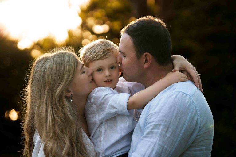 Family photo couple with toddler boy on the beach during sunset in Brisbane 36 768x512