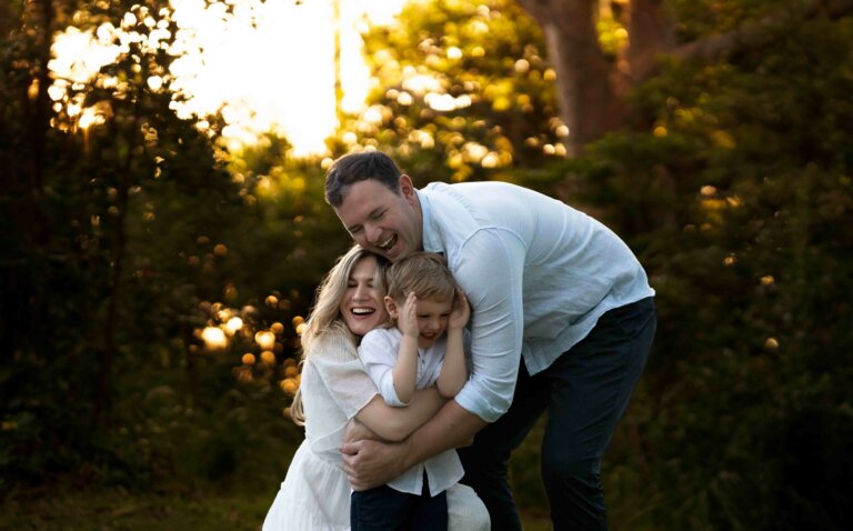 Family photo couple with toddler boy playing in park reserve during sunset in Brisbane 15 768x478