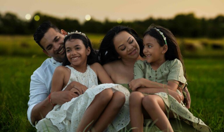 Family photo mother with 2 daughters girls playing in open field park reserve during sunset in Brisbane 27 768x452
