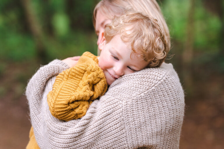 Mother and son cuddle family portrait 768x511