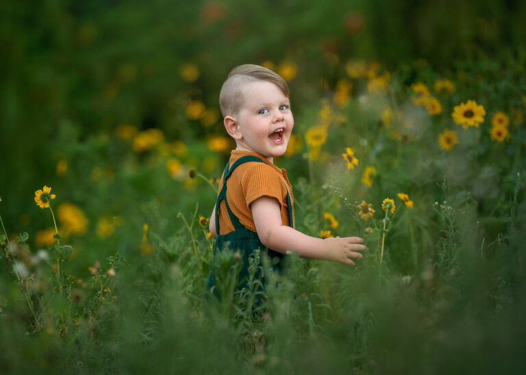 Perth Child Photography www.sacredseedphotography.com .au Perth toddler in a flower field copy 768x548